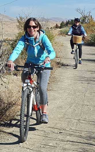 My Daughter Mindy with Gwen right behind on her new bike.