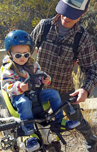 Lucy rides with Dad