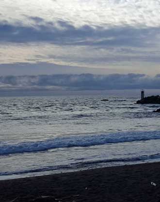 A storm approaching from the west in the afternoon