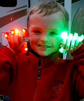 Noah with finger lights