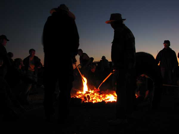 The memorial service ends in a "dog burn" near The Names