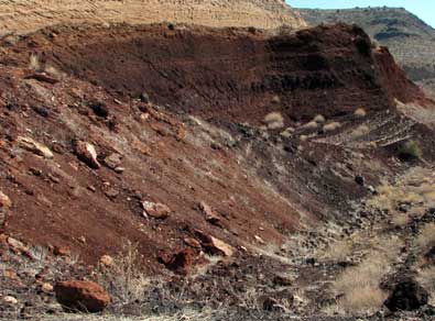 Cinderstone used in construction and roads, an inactive cinder mining pit.