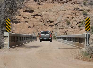 Driving across the single lane Safford Bridge. 