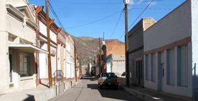 The narrow main street of Clifton, nearly a ghost town business district.