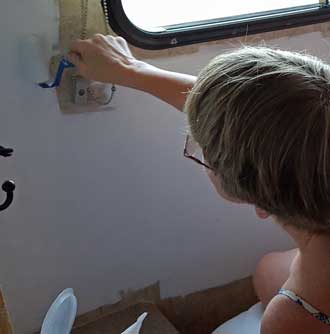 Gwen paints the bedroom walls