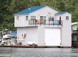 Floating home (houseboat) between the island and mainland