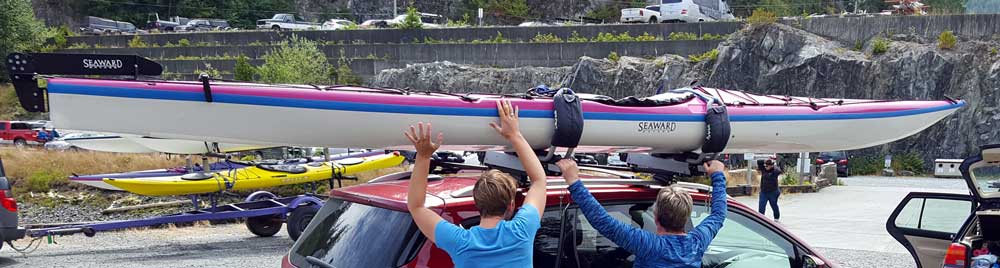 A "self loading" kayak rack