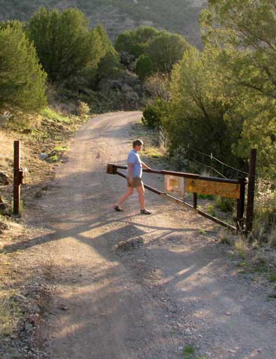 Opening the gate to enter this private RV campground