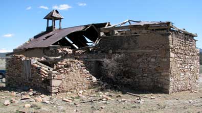 Mangas ghost town deteriorating adobe