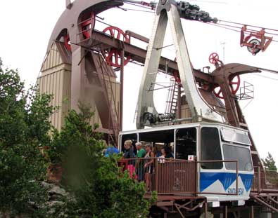 The tram is docking and unloading passengers