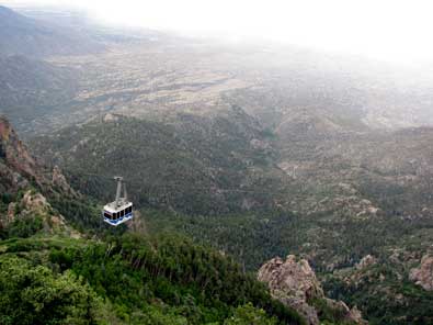 The tram is ascending the mountain from Albuquerque, just about to dock