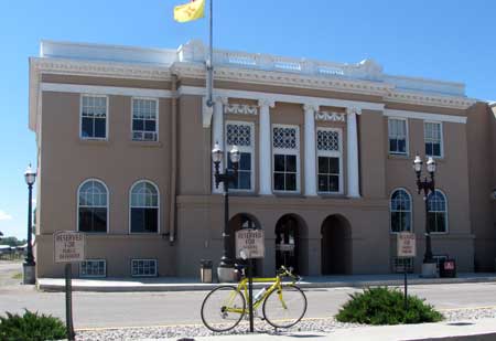 County offices in Teirra Amarilla, my road bike leaning against the parking sign in front