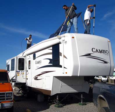 Sergio and his crew start the clean process on our trailer