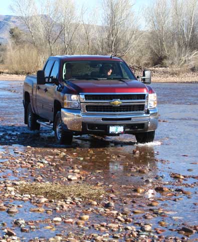 "Wading through the river for a Geocache"