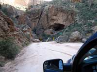 Crossing the one lane bridge to begin the cliff climb