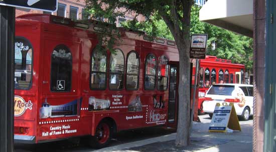 A Grey Line tour of the downtown area of Nashville; behind: in line for tickets