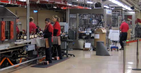 The bottling room, behind: the tasting room and gift shop.