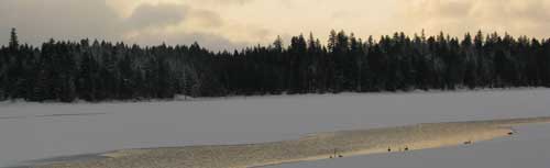 Light playing on a frozen lake