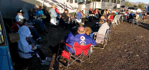 Crowded against the motorhomes to avoid the wind