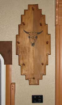 Coat Rack to the right of the door