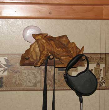 Leash rack under entrance mirror