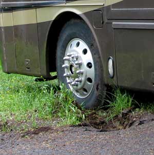 Left front wheel is holding the coach back