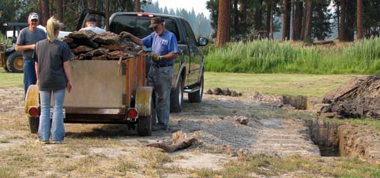 Filling the pit with wood