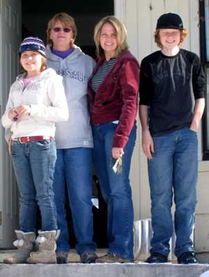 Standing on a snowy porch