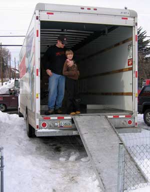 Johm and Courtney are loading the U-Haul