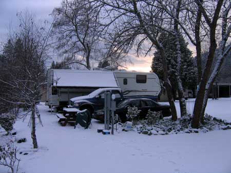 Sun sets after a snow storm