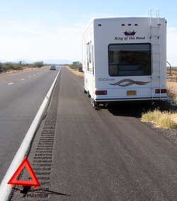 The left rear trailer tire blew out