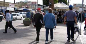 Jack and Laura take Gwen into the shopping district