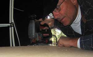 Cutting the cat hole in the basement wall