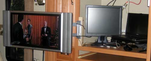 TV Located left to allow use of the entertainment center as a computer workstation