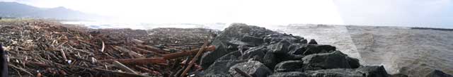Click to see the larger view of the mouth of the Rogue River as well as the debris gathering on the beach
