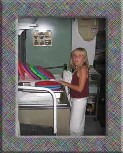 Courtney drying plates after catered dinner