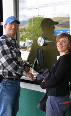 Dale and Mindy purchase movie tickets