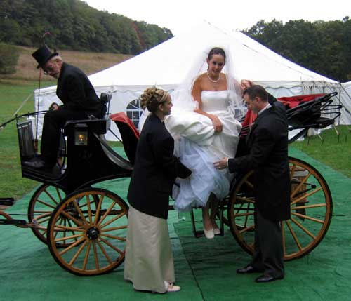 Kim, the bride is assisted by the groom, Ben and Maid of Honor, Katie