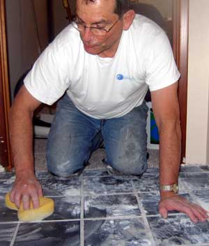 Grouting the tile