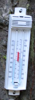 My minimum/maximum thermometer screwed to a tree outside my RV.