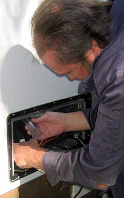 Russ dives into the furnace repair